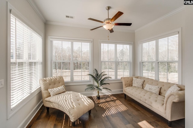 sunroom / solarium with ceiling fan and a wealth of natural light