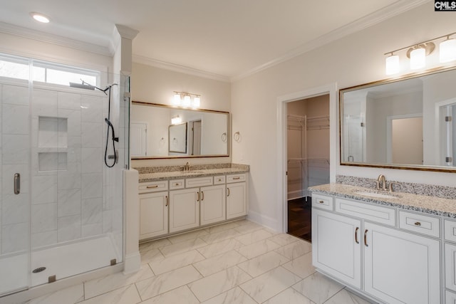 bathroom featuring dual vanity, tile flooring, a shower with shower door, and ornamental molding