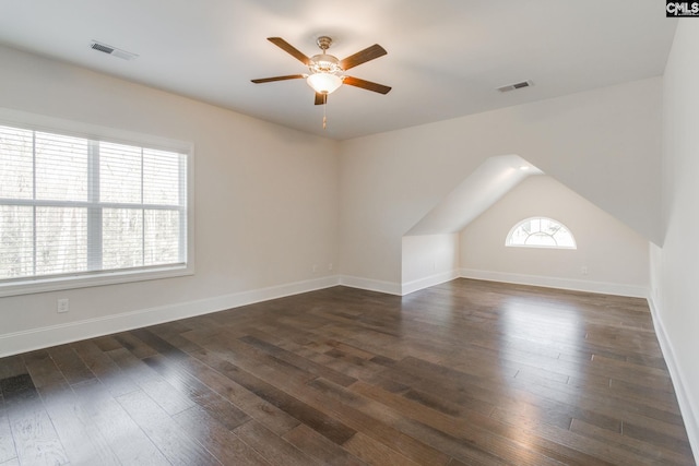 empty room featuring ceiling fan and dark hardwood / wood-style floors