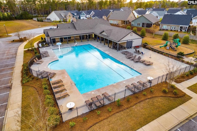 view of pool featuring a patio area