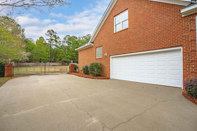 view of side of property featuring a garage