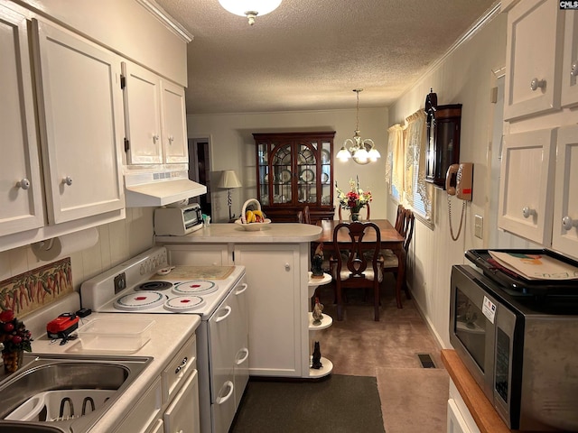 kitchen featuring pendant lighting, white electric range oven, a notable chandelier, and white cabinetry