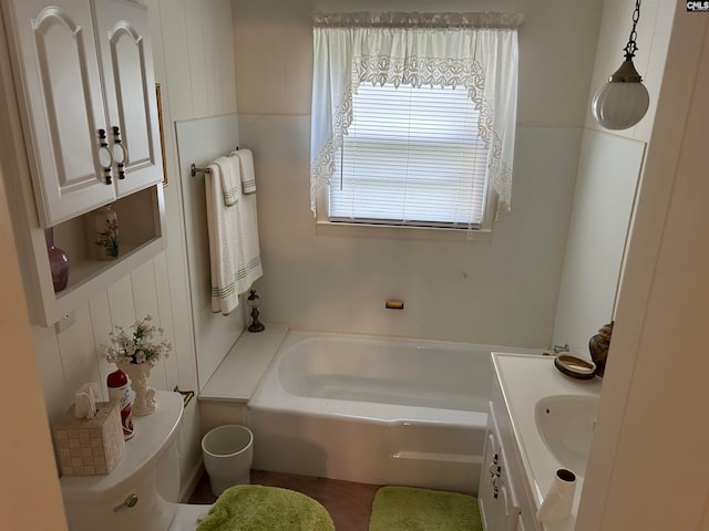 bathroom with vanity and a bathing tub