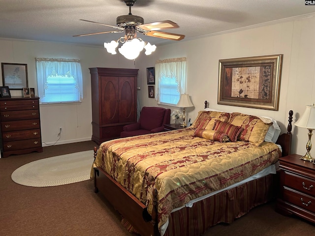 carpeted bedroom with multiple windows, a textured ceiling, and ceiling fan