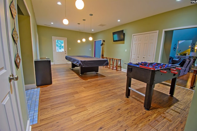 game room featuring light hardwood / wood-style flooring and pool table