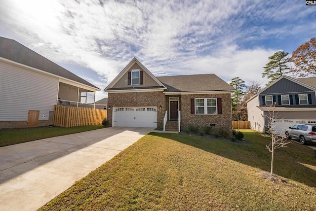 view of front of house with a front lawn and a garage