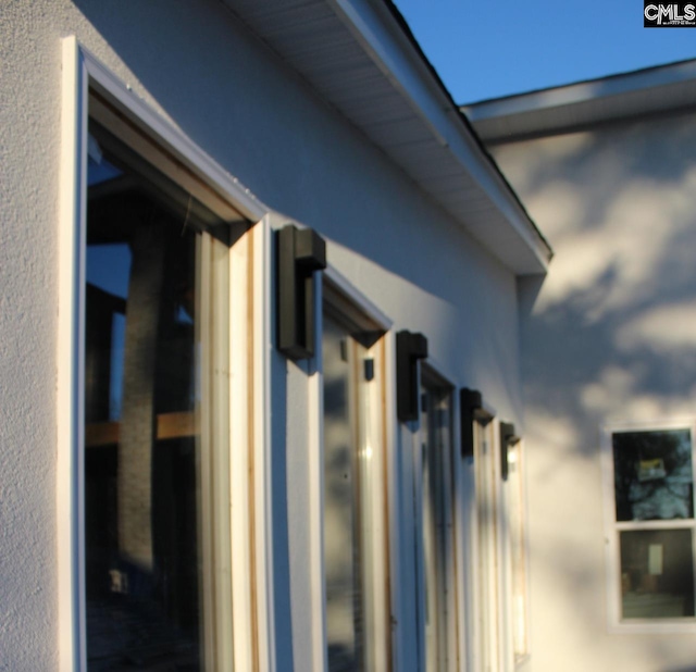 exterior space featuring stucco siding