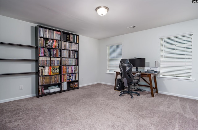 home office featuring light carpet