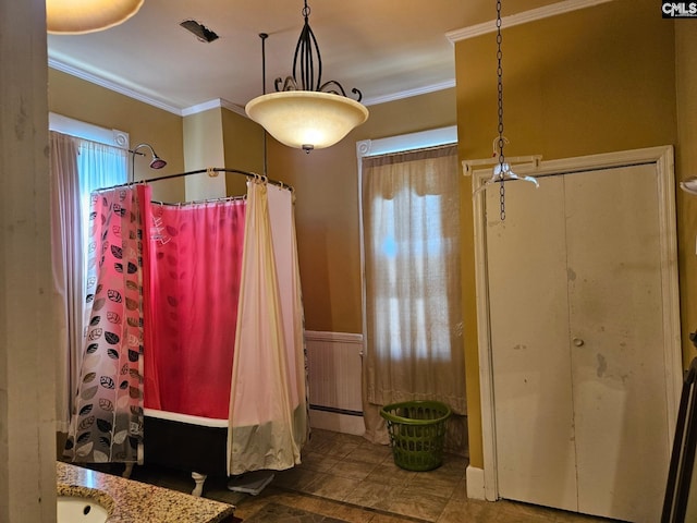 bathroom with ornamental molding and tile flooring