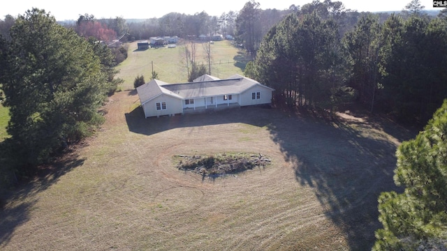 birds eye view of property featuring a rural view