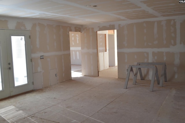 interior space with french doors and a healthy amount of sunlight