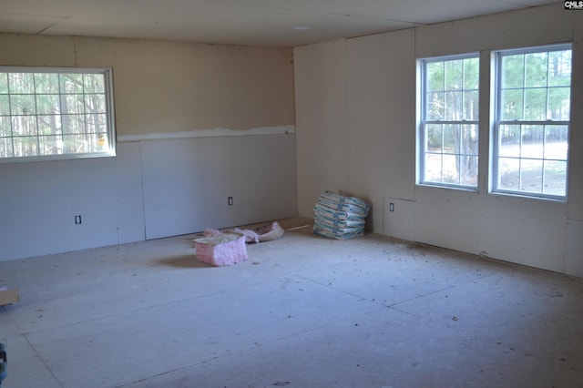 spare room with plenty of natural light