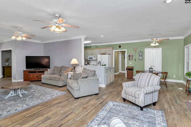 230 Wildlife Rd, Lexington, SC 29072 - living room with ceiling fan, ornamental molding, and light hardwood / wood-style floors