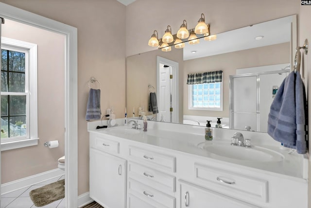 230 Wildlife Rd, Lexington, SC 29072 - bathroom featuring toilet, double sink vanity, and tile flooring