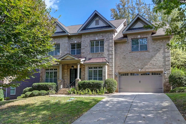 craftsman-style home with a front yard and a garage