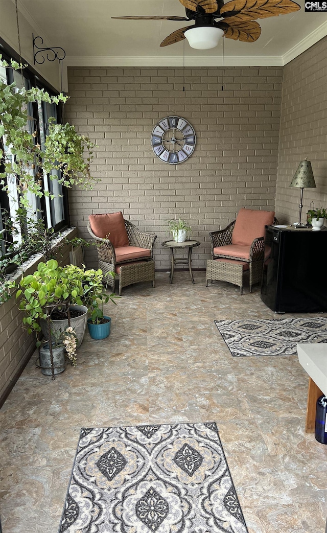 view of terrace with ceiling fan and an outdoor hangout area