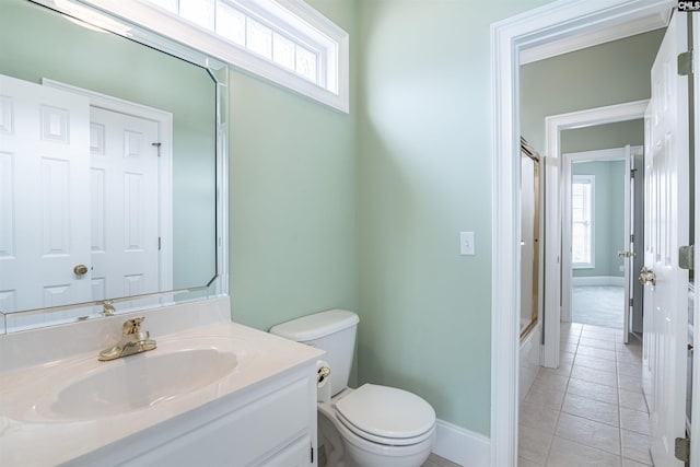 full bathroom featuring tile flooring, shower / bath combination with glass door, toilet, and oversized vanity