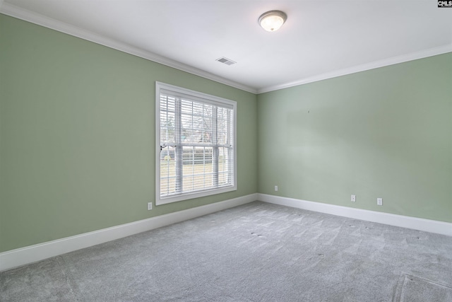 empty room with light carpet and ornamental molding