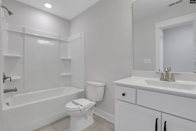 bathroom featuring visible vents, tub / shower combination, toilet, tile patterned floors, and vanity