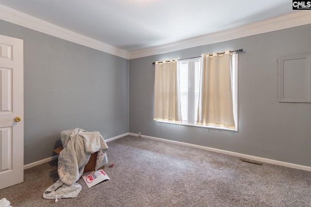 game room with crown molding and dark colored carpet