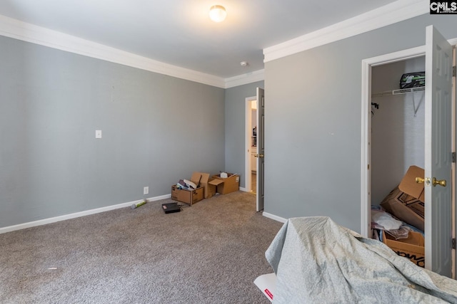 carpeted bedroom with a closet and ornamental molding