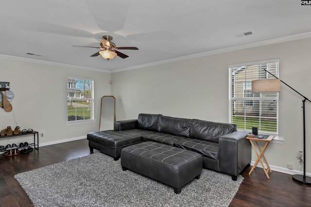 living room featuring crown molding, dark hardwood / wood-style floors, and ceiling fan