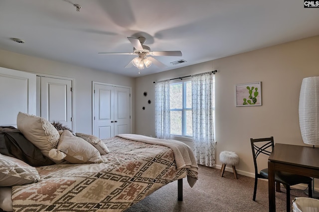 carpeted bedroom with ceiling fan