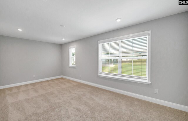 view of carpeted spare room