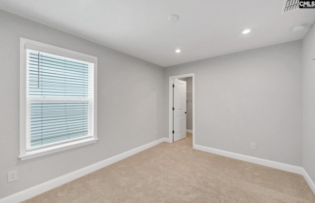 view of carpeted spare room