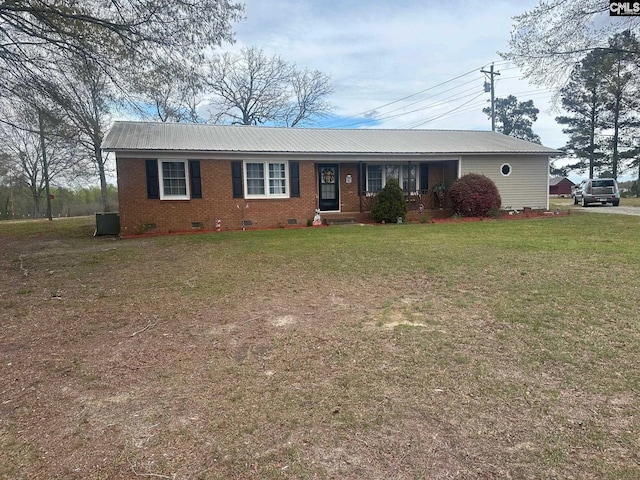 single story home with a front lawn