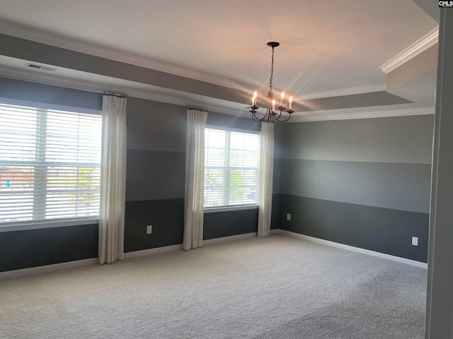 carpeted empty room with ornamental molding and a notable chandelier