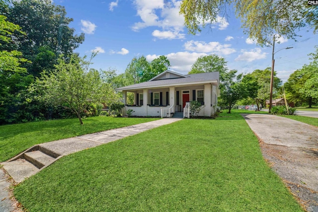 view of front of house featuring a porch and a front yard