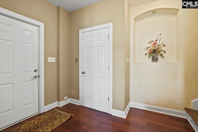 entryway featuring dark hardwood / wood-style floors