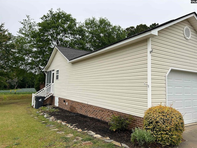 view of property exterior featuring a lawn