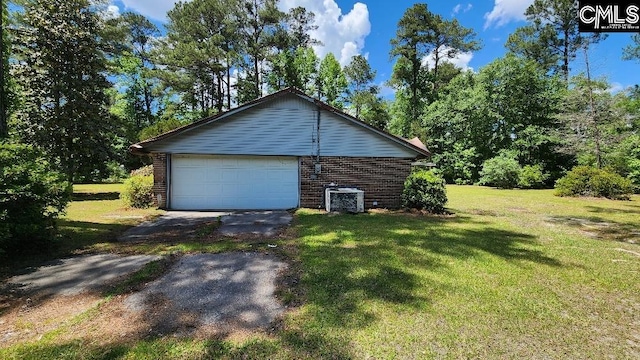 view of property exterior with a lawn