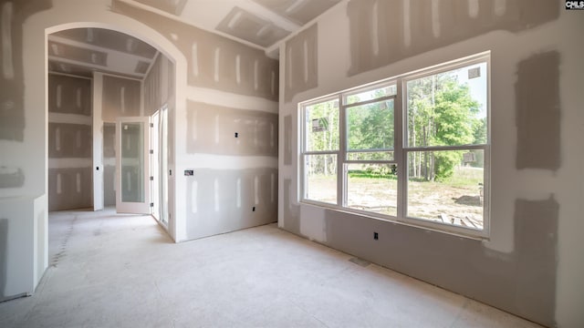 empty room featuring plenty of natural light