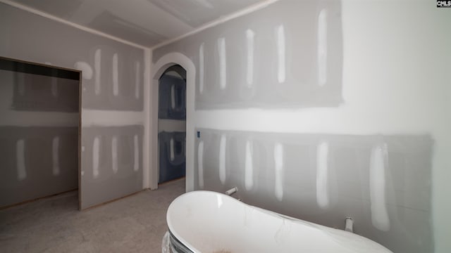 bathroom with concrete flooring