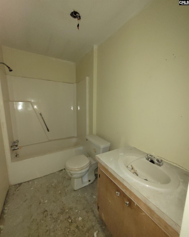 bathroom featuring toilet, vanity, and shower / bathing tub combination