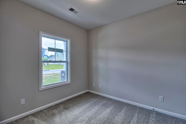 empty room featuring carpet flooring