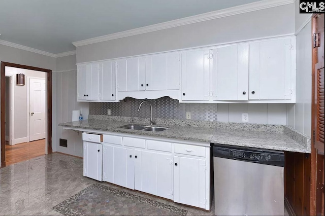 kitchen featuring white cabinets, ornamental molding, sink, stainless steel dishwasher, and tasteful backsplash