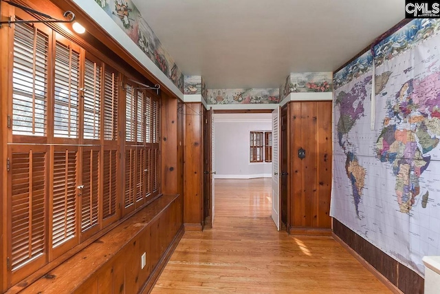 hallway with light wood-type flooring