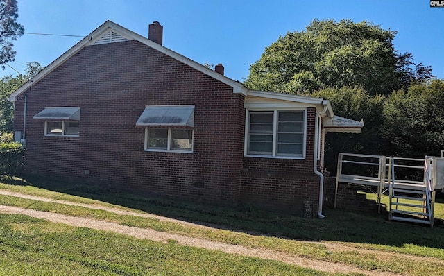 view of property exterior featuring a yard