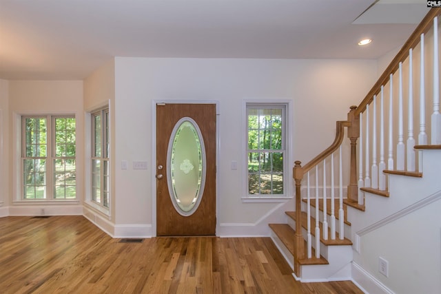 entrance foyer with light hardwood / wood-style flooring