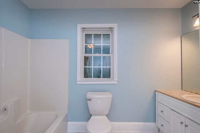 full bathroom featuring vanity,  shower combination, and toilet