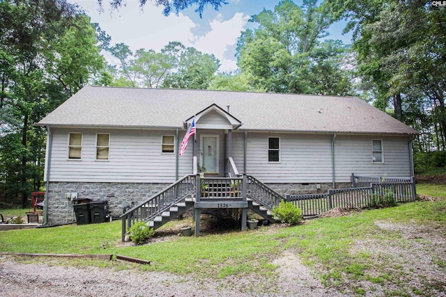 view of front facade with a front yard