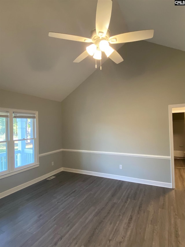 unfurnished room featuring ceiling fan, lofted ceiling, and dark hardwood / wood-style floors