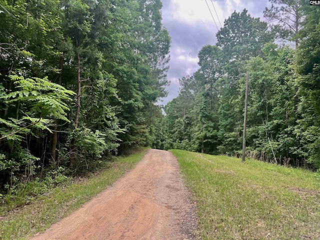 view of street featuring a view of trees