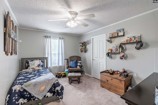 bedroom featuring a textured ceiling, carpet floors, ornamental molding, and a ceiling fan