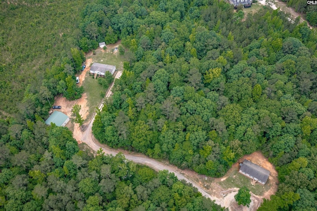 bird's eye view featuring a forest view