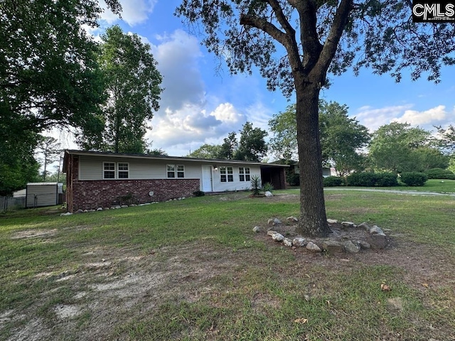 exterior space featuring a front lawn